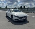 Белый Фольксваген Arteon, объемом двигателя 2 л и пробегом 155 тыс. км за 29999 $, фото 2 на Automoto.ua