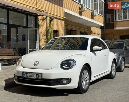 Белый Фольксваген Битл, объемом двигателя 1.4 л и пробегом 145 тыс. км за 9800 $, фото 1 на Automoto.ua