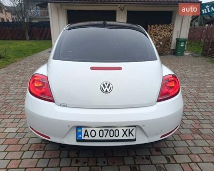 Белый Фольксваген Битл, объемом двигателя 1.6 л и пробегом 147 тыс. км за 9500 $, фото 18 на Automoto.ua