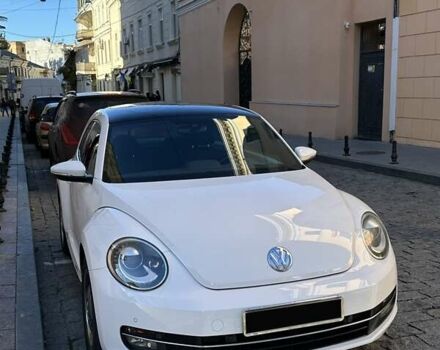 Белый Фольксваген Битл, объемом двигателя 1.4 л и пробегом 70 тыс. км за 13400 $, фото 2 на Automoto.ua