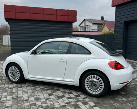 Белый Фольксваген Битл, объемом двигателя 1.8 л и пробегом 174 тыс. км за 11499 $, фото 6 на Automoto.ua