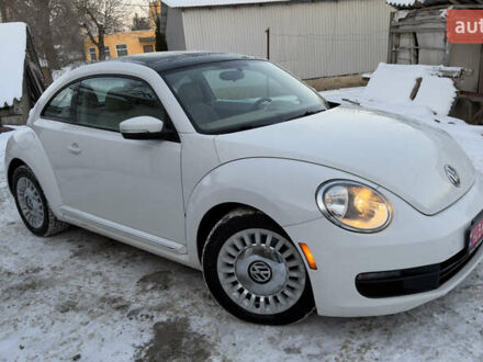Белый Фольксваген Битл, объемом двигателя 2.5 л и пробегом 130 тыс. км за 9900 $, фото 1 на Automoto.ua