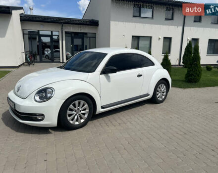 Белый Фольксваген Битл, объемом двигателя 1.8 л и пробегом 141 тыс. км за 12000 $, фото 1 на Automoto.ua