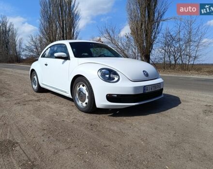Белый Фольксваген Битл, объемом двигателя 1.8 л и пробегом 141 тыс. км за 14000 $, фото 1 на Automoto.ua