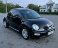 Черный Фольксваген Битл, объемом двигателя 1.6 л и пробегом 260 тыс. км за 4000 $, фото 1 на Automoto.ua