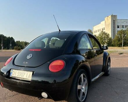 Черный Фольксваген Битл, объемом двигателя 1.6 л и пробегом 210 тыс. км за 5900 $, фото 2 на Automoto.ua