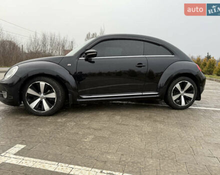 Черный Фольксваген Битл, объемом двигателя 2 л и пробегом 219 тыс. км за 13000 $, фото 2 на Automoto.ua