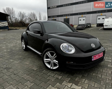 Черный Фольксваген Битл, объемом двигателя 1.8 л и пробегом 194 тыс. км за 12500 $, фото 1 на Automoto.ua