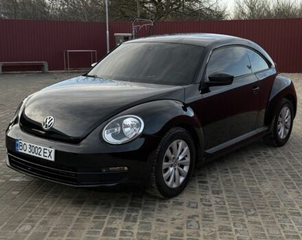 Черный Фольксваген Битл, объемом двигателя 1.8 л и пробегом 62 тыс. км за 12900 $, фото 1 на Automoto.ua