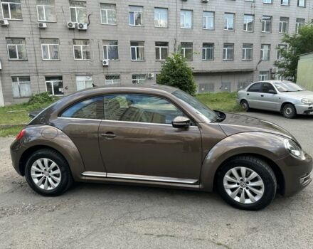 Коричневый Фольксваген Битл, объемом двигателя 1.4 л и пробегом 117 тыс. км за 12000 $, фото 4 на Automoto.ua