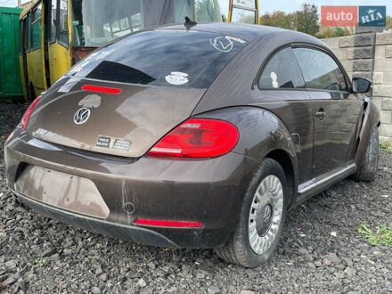 Фольксваген Битл 2014 в Луцке на Automoto.ua Коричневый Фольксваген Битл, объемом двигателя 1.8 л и пробегом 170 тыс. км за 4400 $, фото 1 на Automoto.ua