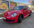 Красный Фольксваген Битл, объемом двигателя 1.8 л и пробегом 142 тыс. км за 13400 $, фото 1 на Automoto.ua