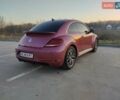 Красный Фольксваген Битл, объемом двигателя 1.8 л и пробегом 130 тыс. км за 12900 $, фото 1 на Automoto.ua