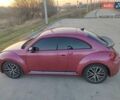 Красный Фольксваген Битл, объемом двигателя 1.8 л и пробегом 136 тыс. км за 12900 $, фото 1 на Automoto.ua