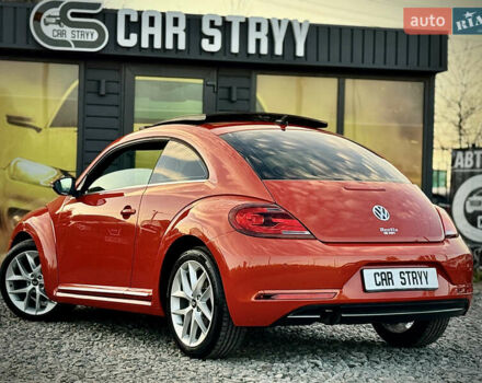 Червоний Фольксваген Бітл, об'ємом двигуна 2 л та пробігом 180 тис. км за 16999 $, фото 2 на Automoto.ua