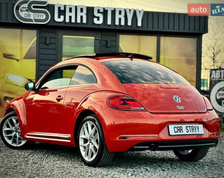 Червоний Фольксваген Бітл, об'ємом двигуна 2 л та пробігом 180 тис. км за 15999 $, фото 2 на Automoto.ua