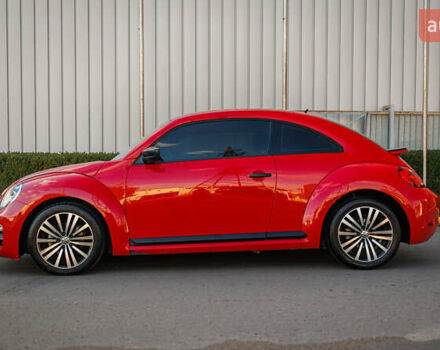 Красный Фольксваген Битл, объемом двигателя 1.98 л и пробегом 74 тыс. км за 13200 $, фото 1 на Automoto.ua