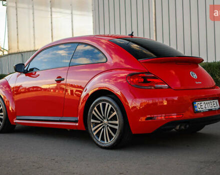 Красный Фольксваген Битл, объемом двигателя 1.98 л и пробегом 74 тыс. км за 13200 $, фото 2 на Automoto.ua