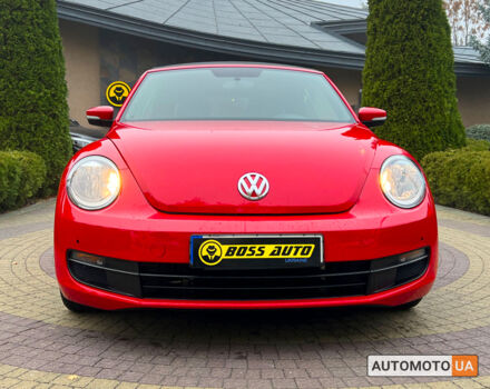 Красный Фольксваген Битл, объемом двигателя 1.8 л и пробегом 120 тыс. км за 12600 $, фото 1 на Automoto.ua