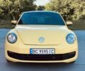 Жовтий Фольксваген Бітл, об'ємом двигуна 2.5 л та пробігом 146 тис. км за 11700 $, фото 1 на Automoto.ua
