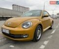 Желтый Фольксваген Битл, объемом двигателя 1.39 л и пробегом 116 тыс. км за 14000 $, фото 1 на Automoto.ua