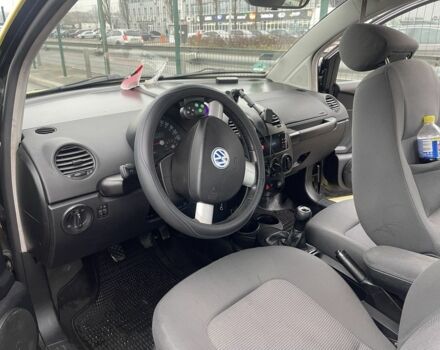 Желтый Фольксваген Битл, объемом двигателя 1.6 л и пробегом 283 тыс. км за 3100 $, фото 7 на Automoto.ua