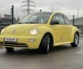 Желтый Фольксваген Битл, объемом двигателя 1.6 л и пробегом 283 тыс. км за 3100 $, фото 1 на Automoto.ua