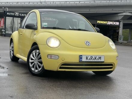 Желтый Фольксваген Битл, объемом двигателя 1.6 л и пробегом 283 тыс. км за 3100 $, фото 1 на Automoto.ua