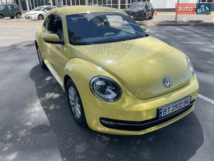 Желтый Фольксваген Битл, объемом двигателя 1.4 л и пробегом 153 тыс. км за 10950 $, фото 1 на Automoto.ua