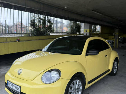 Желтый Фольксваген Битл, объемом двигателя 1.8 л и пробегом 157 тыс. км за 9900 $, фото 1 на Automoto.ua