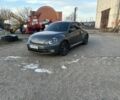 Серый Фольксваген Битл, объемом двигателя 2.5 л и пробегом 260 тыс. км за 8800 $, фото 1 на Automoto.ua