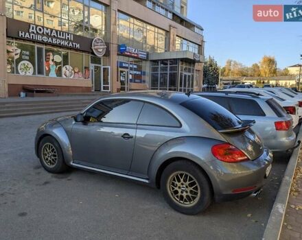 Сірий Фольксваген Бітл, об'ємом двигуна 1.8 л та пробігом 85 тис. км за 11999 $, фото 2 на Automoto.ua