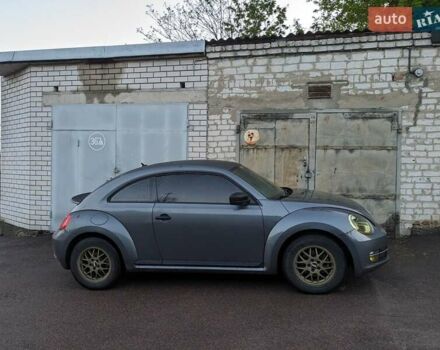 Сірий Фольксваген Бітл, об'ємом двигуна 1.8 л та пробігом 85 тис. км за 11999 $, фото 6 на Automoto.ua