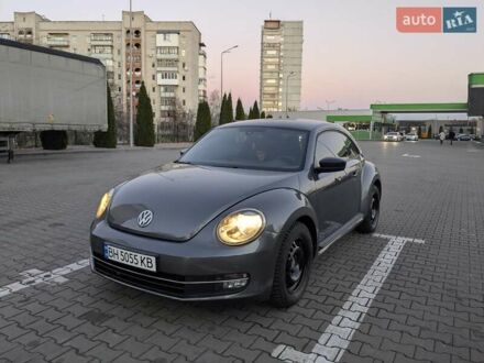 Серый Фольксваген Битл, объемом двигателя 1.8 л и пробегом 85 тыс. км за 11999 $, фото 1 на Automoto.ua