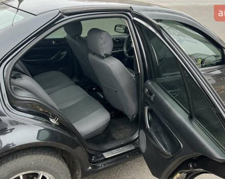 Черный Фольксваген Бора, объемом двигателя 1.6 л и пробегом 306 тыс. км за 3500 $, фото 4 на Automoto.ua