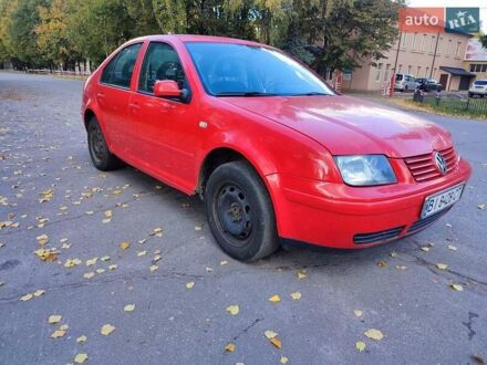 Красный Фольксваген Бора, объемом двигателя 1.6 л и пробегом 312 тыс. км за 2750 $, фото 1 на Automoto.ua