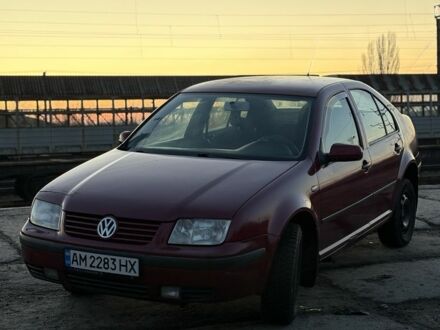 Красный Фольксваген Бора, объемом двигателя 1.6 л и пробегом 285 тыс. км за 2550 $, фото 1 на Automoto.ua