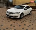 Білий Фольксваген CC / Passat CC, об'ємом двигуна 1.8 л та пробігом 209 тис. км за 9800 $, фото 1 на Automoto.ua