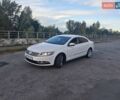 Білий Фольксваген CC / Passat CC, об'ємом двигуна 2 л та пробігом 200 тис. км за 9300 $, фото 1 на Automoto.ua