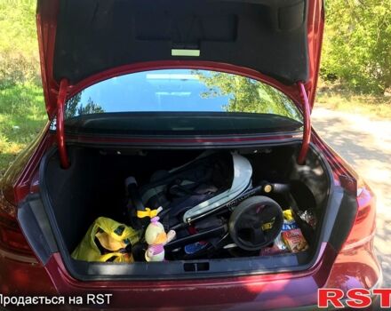 Червоний Фольксваген CC, об'ємом двигуна 2 л та пробігом 130 тис. км за 11500 $, фото 1 на Automoto.ua