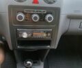 Білий Фольксваген Кадді, об'ємом двигуна 1.2 л та пробігом 230 тис. км за 5600 $, фото 5 на Automoto.ua