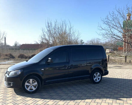 Черный Фольксваген Кадди, объемом двигателя 1.6 л и пробегом 265 тыс. км за 8700 $, фото 2 на Automoto.ua