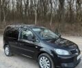 Черный Фольксваген Кадди, объемом двигателя 1.6 л и пробегом 325 тыс. км за 12200 $, фото 1 на Automoto.ua
