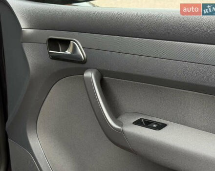 Фиолетовый Фольксваген Кадди, объемом двигателя 1.6 л и пробегом 265 тыс. км за 11499 $, фото 86 на Automoto.ua