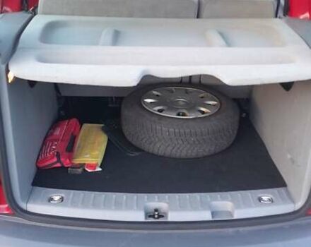 Красный Фольксваген Кадди, объемом двигателя 1.4 л и пробегом 192 тыс. км за 6299 $, фото 1 на Automoto.ua