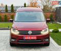 Красный Фольксваген Кадди, объемом двигателя 2 л и пробегом 246 тыс. км за 15950 $, фото 1 на Automoto.ua