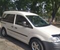 Білий Фольксваген Caddy пасс., об'ємом двигуна 2 л та пробігом 230 тис. км за 7399 $, фото 1 на Automoto.ua