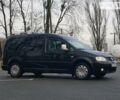 Чорний Фольксваген Caddy пасс., об'ємом двигуна 2 л та пробігом 220 тис. км за 9555 $, фото 1 на Automoto.ua