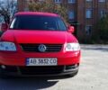 Червоний Фольксваген Caddy пасс., об'ємом двигуна 2 л та пробігом 128 тис. км за 10300 $, фото 1 на Automoto.ua