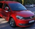 Червоний Фольксваген Caddy пасс., об'ємом двигуна 2 л та пробігом 180 тис. км за 10500 $, фото 1 на Automoto.ua